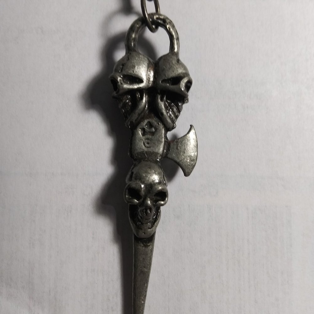 Scull Necklace and hanger Vintage on an axe